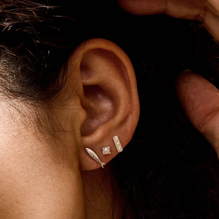 3 Pearl Bar Earrings in sterling silver, shown worn on hand 2