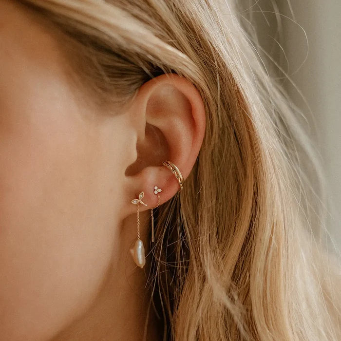 Abacus Tripod Diamond Earring in 14k yellow gold with white diamond, alternate angle detail view