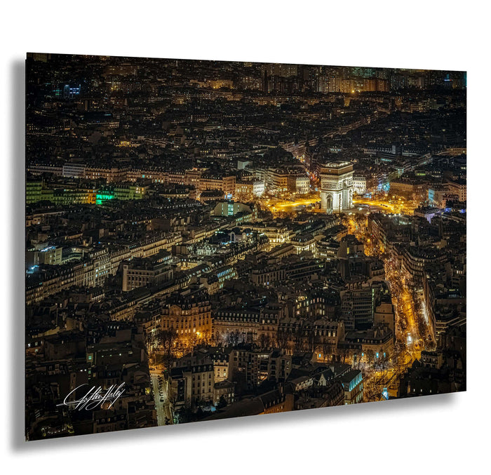 a bustling cityscape at night, with numerous illuminated buildings and streets creating a vibrant and lively atmosphere.
