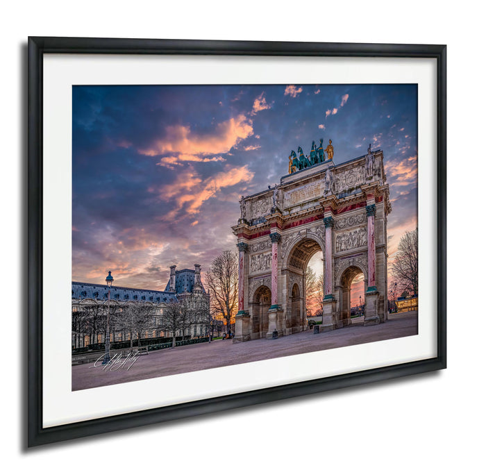 a large, ornate archway with intricate carvings and statues, set against a vibrant sky with colorful clouds.