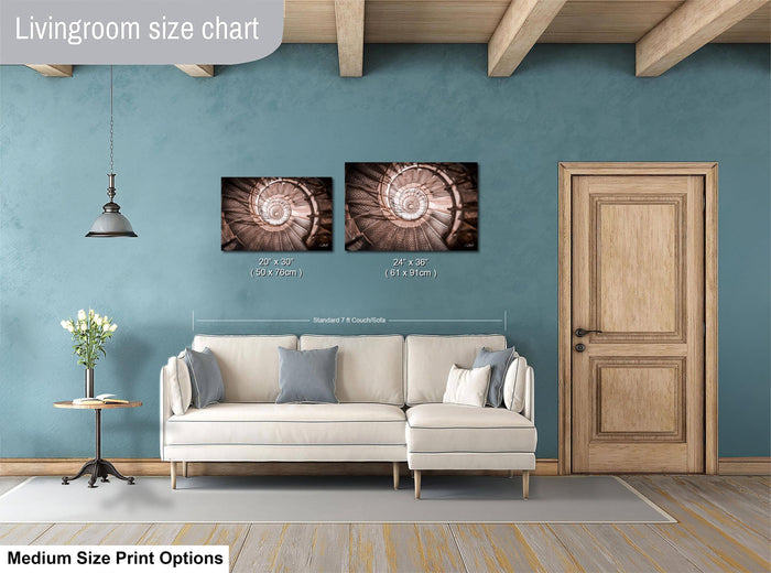 a living room with a white sofa, a wooden door, and a painting of a spiral staircase on the wall. The living room appears to be well-lit and decorated with a wooden floor and a hanging light fixture.
