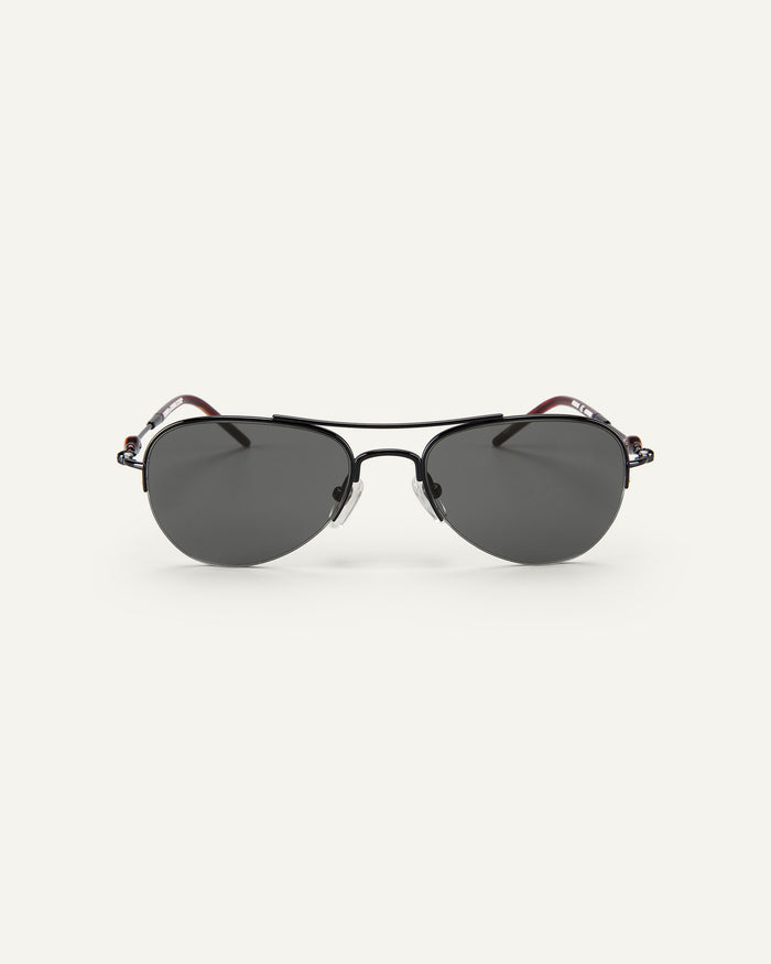 Face shot of Bonnie Clyde Autobio aviator sunglasses in black with black lenses.