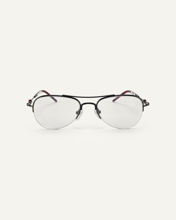 Face shot of Bonnie Clyde Autobio aviator optical frames in black with clear lenses.