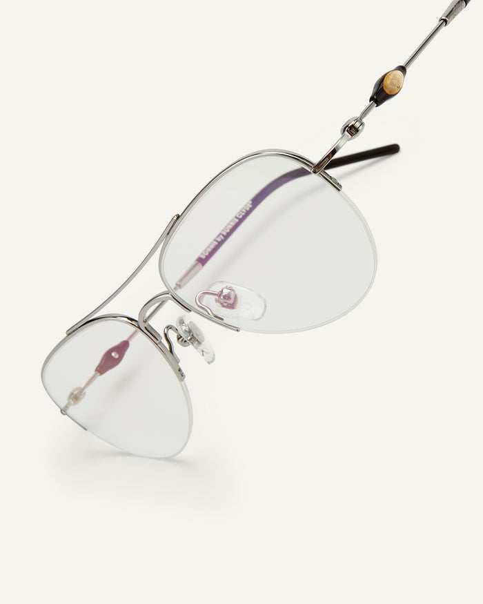 Close-up shot of Bonnie Clyde Autobio aviator optical frames in silver with clear lenses.