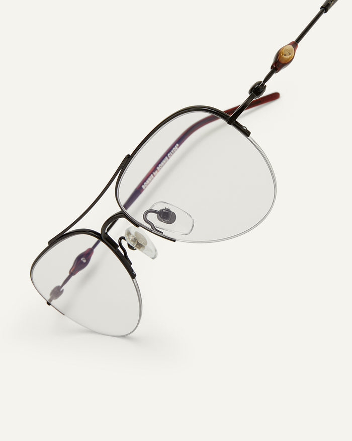 Close-up shot of Bonnie Clyde Autobio aviator optical frames in black with clear lenses.