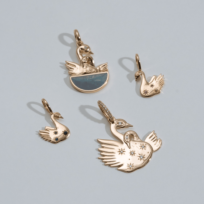 Healing Water Swan Charm in 10k yellow gold with london blue topaz and diamond, alternate angle detail view 2