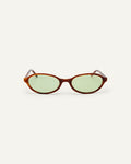 Face shot of Bonnie Clyde Baby oval sunglasses in layered brown with green lenses.