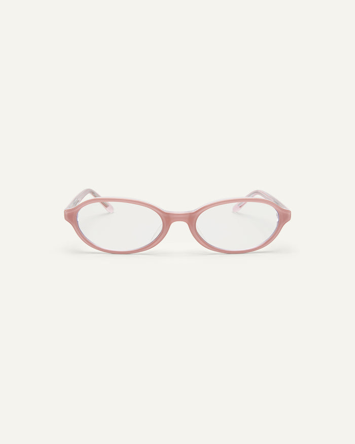 Face shot of Bonnie Clyde Baby oval optical frames in layered pink with clear lenses.