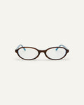 Face shot of Bonnie Clyde Baby oval optical frames in teal demi with clear lenses.