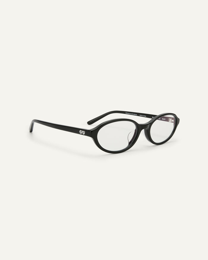 Side shot of Bonnie Clyde Baby oval optical frames in black with clear lenses.