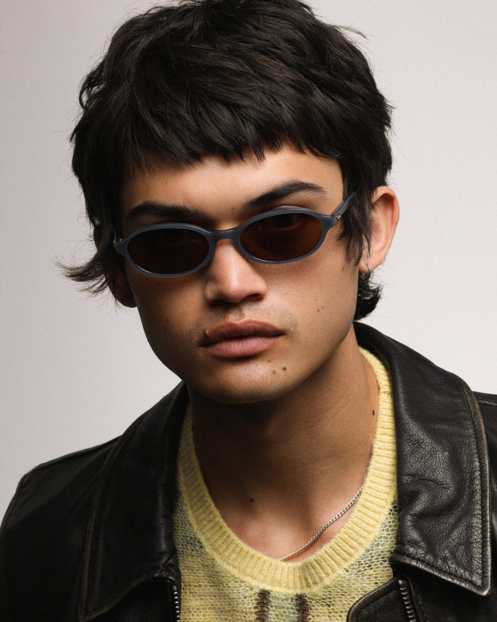 Additional view of Bonnie Clyde Baby oval sunglasses in layered silver with brown lenses.