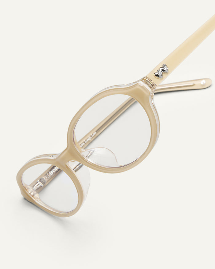 Additional view of Bonnie Clyde Baby oval optical frames in layered off white with clear lenses.