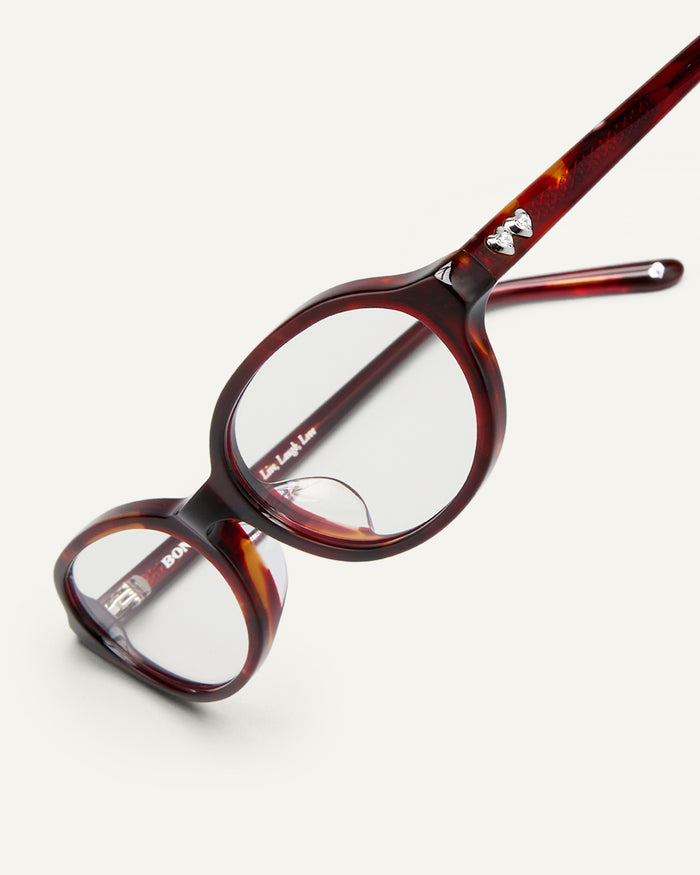 Additional view of Bonnie Clyde Baby oval optical frames in red tortoise with clear lenses.