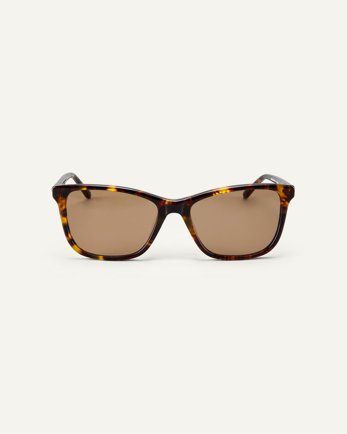 Face shot of Bonnie Clyde Bicep sunglasses in tortoise with brown lenses.