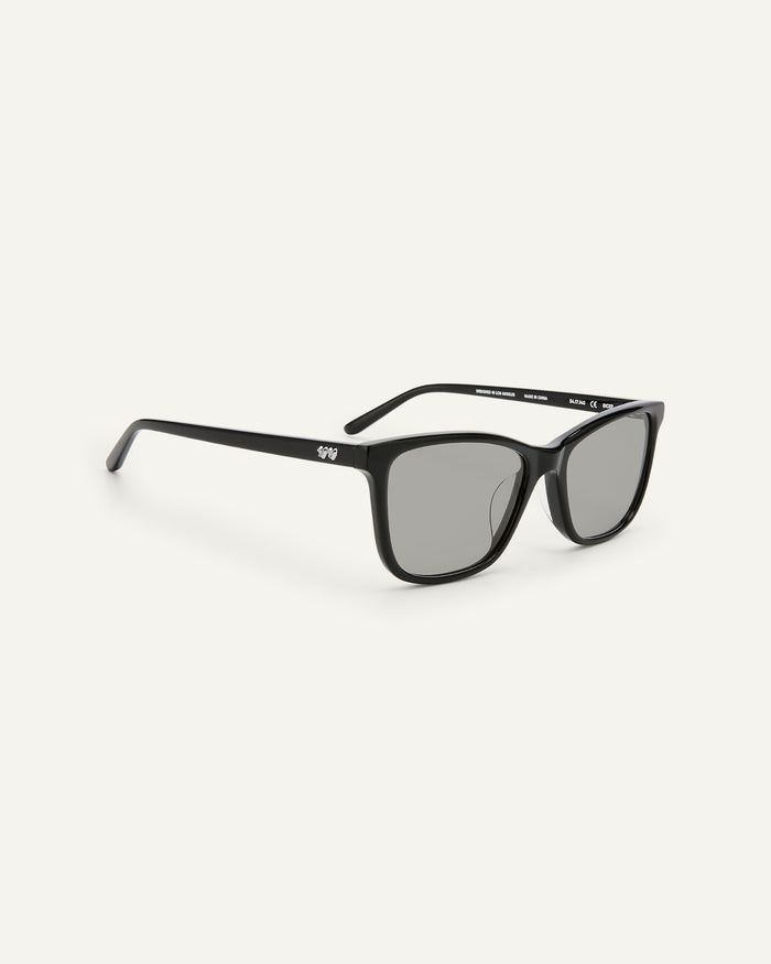 Quarter shot of Bonnie Clyde Bicep sunglasses in black with grey lenses.