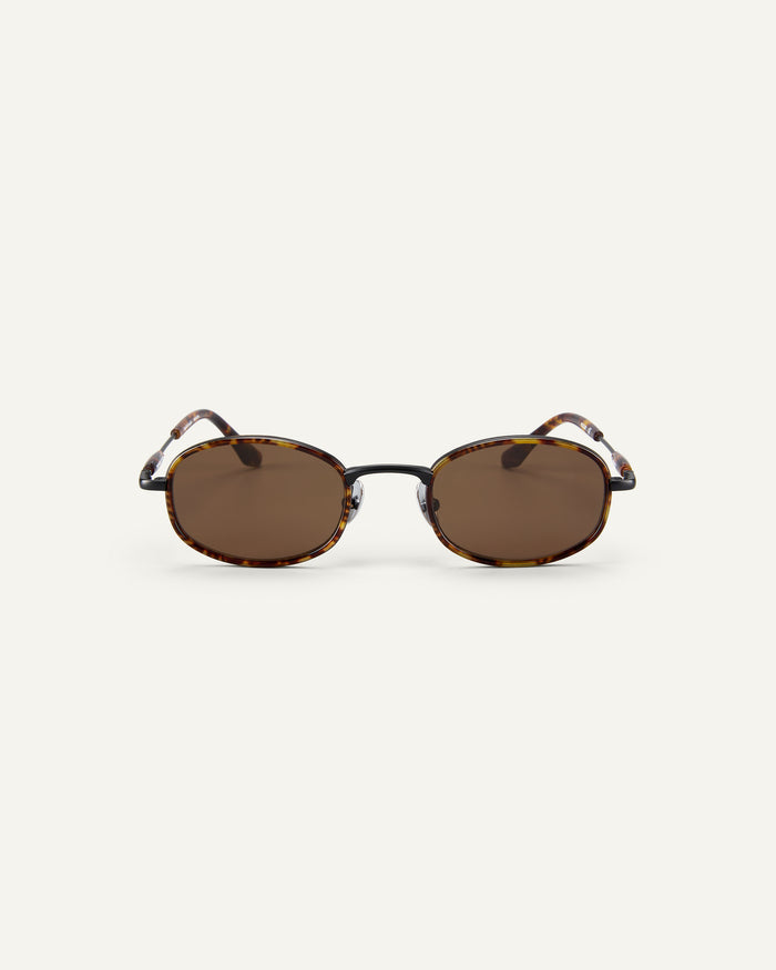 Face shot of Bonnie Clyde Bicycle sunglasses in tortoise with brown lenses.