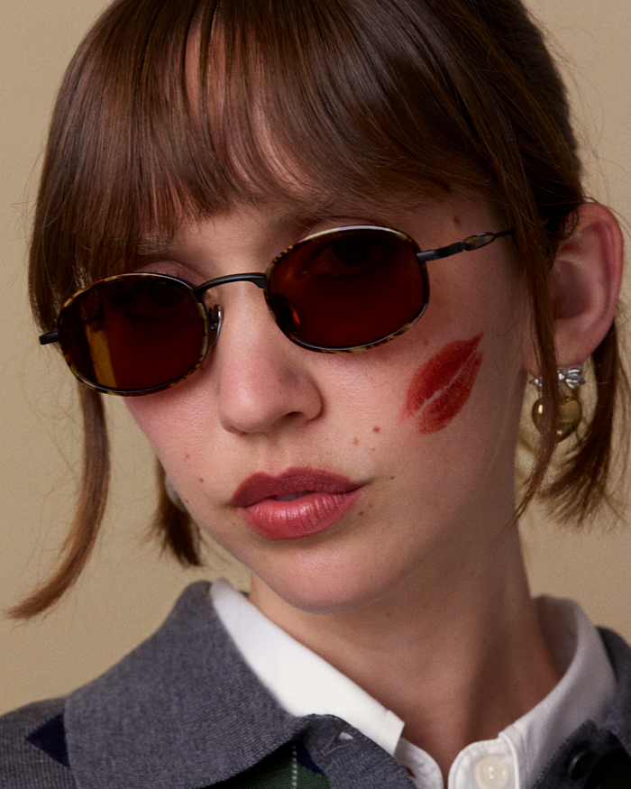Quarter shot of Bonnie Clyde Bicycle sunglasses in tortoise with brown lenses.