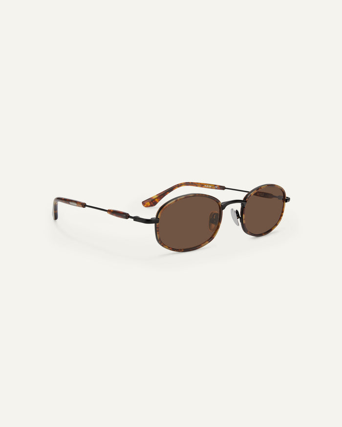Side shot of Bonnie Clyde Bicycle sunglasses in tortoise with brown lenses.