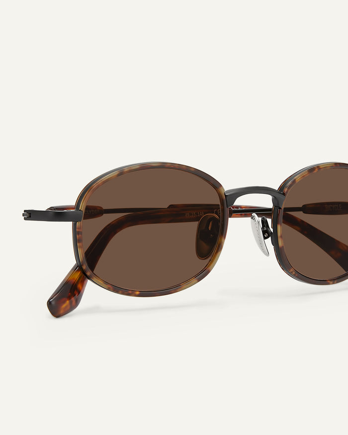 Close-up shot of Bonnie Clyde Bicycle sunglasses in tortoise with brown lenses.