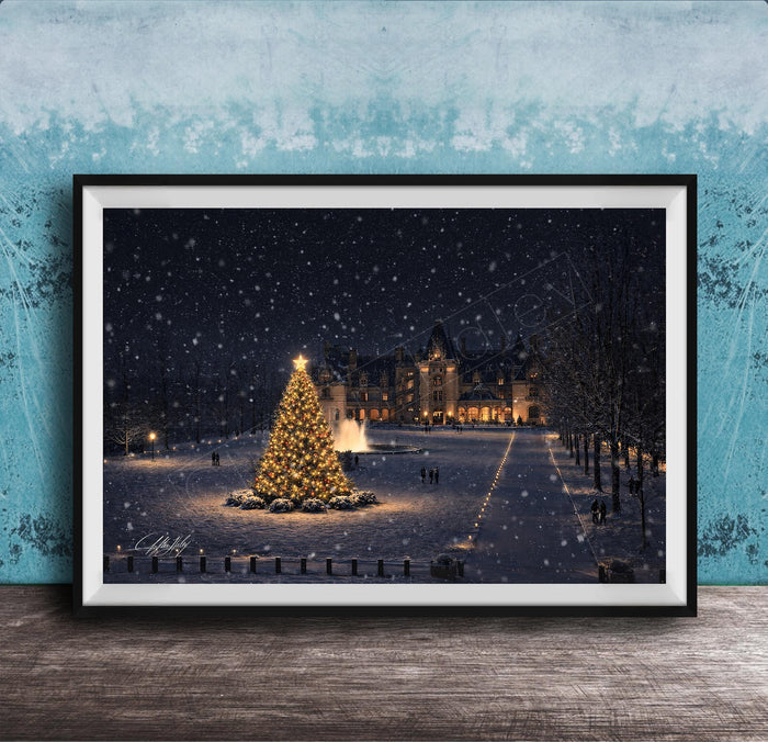 A large, illuminated Christmas tree stands in the center of a snowy park, surrounded by people walking around and enjoying the festive atmosphere.