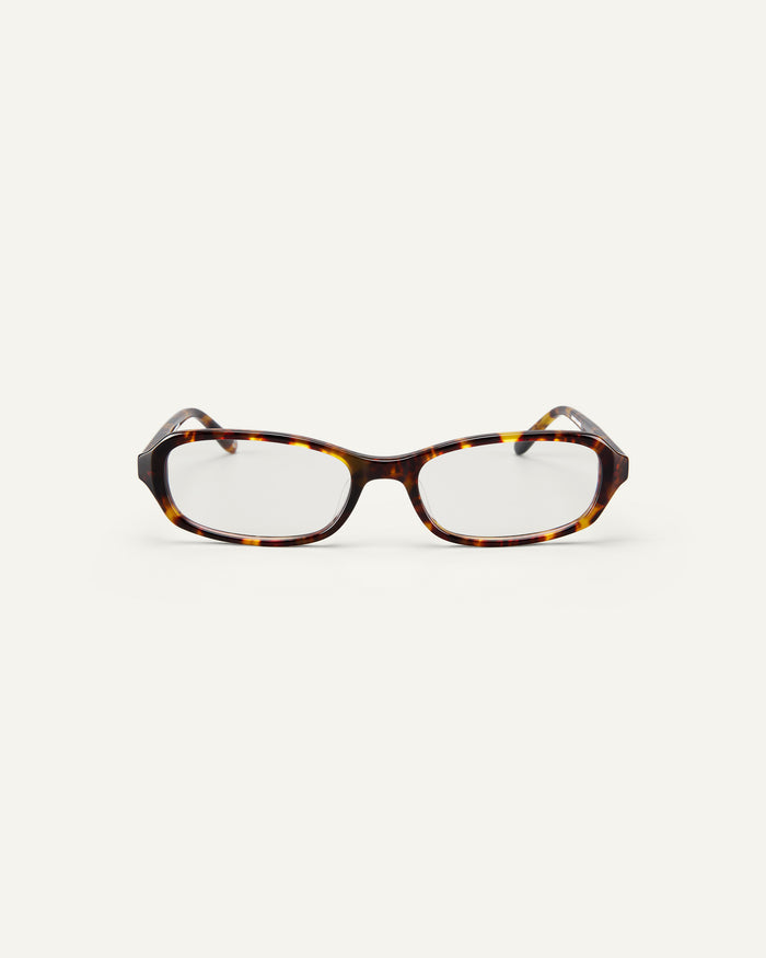 Face shot of Bonnie Clyde Blondie optical frames in tortoise with clear lenses.
