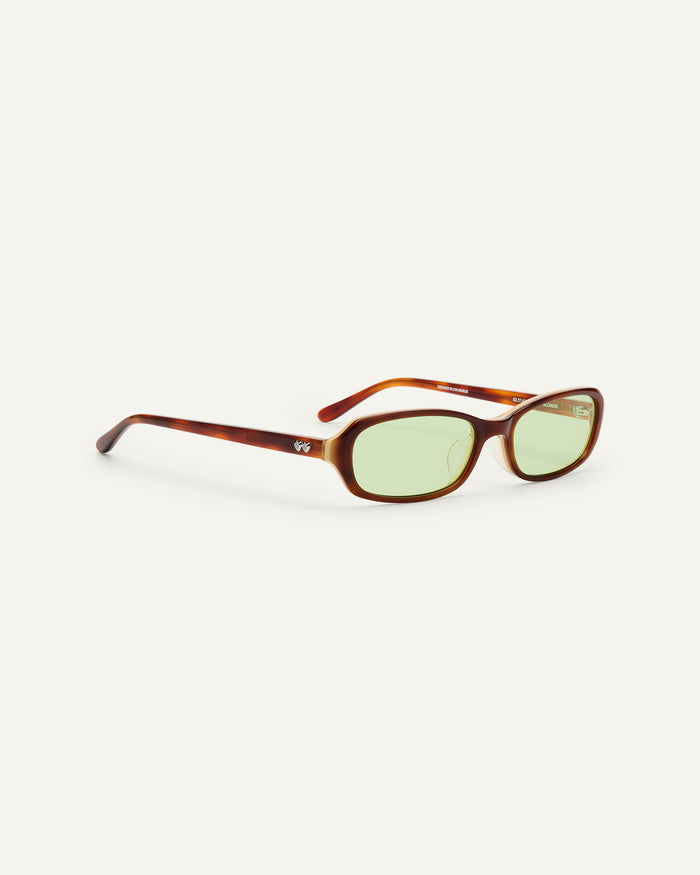 Close-up shot of Bonnie Clyde Blondie sunglasses in brown with green lenses.