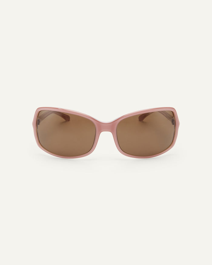 Face shot of Bonnie Clyde Body rounded square sunglasses in layered pink with brown lenses.