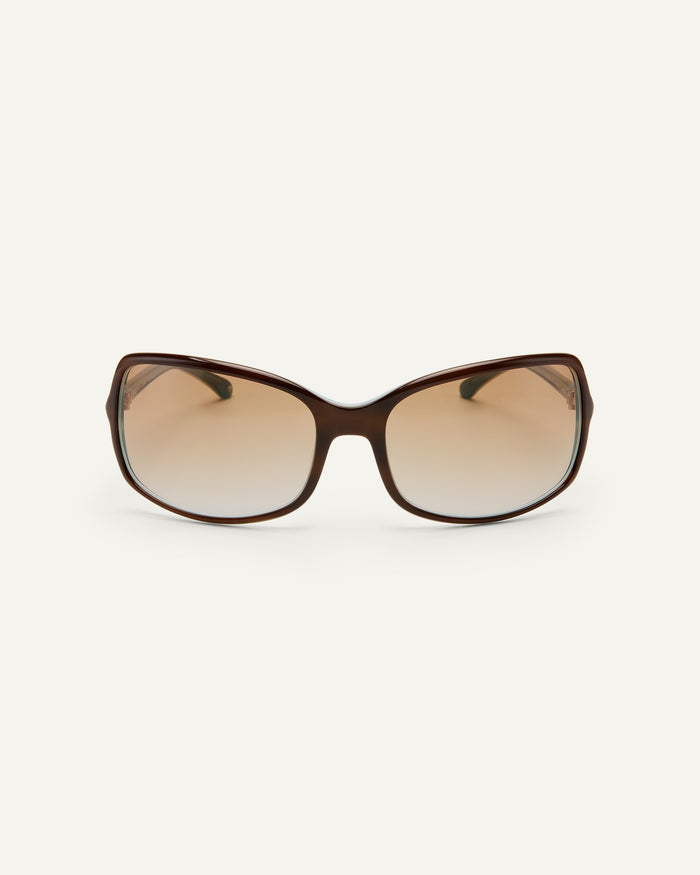 Face shot of Bonnie Clyde Body rounded square sunglasses in teal demi with brown lenses.