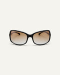 Black, rounded square sunglasses with brown gradient lenses on a white background