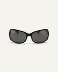 Face shot of Bonnie Clyde Body rounded square sunglasses in black with black lenses.