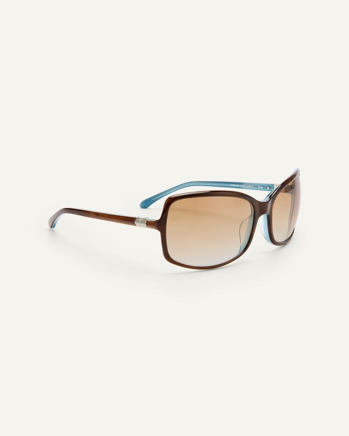 Close-up shot of Bonnie Clyde Body rounded square sunglasses in teal demi with brown lenses.