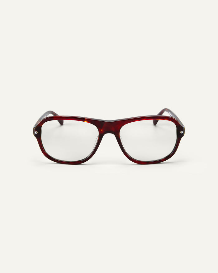 Face shot of Bonnie Clyde Boss Fight optical frames in red tortoise with clear lenses.