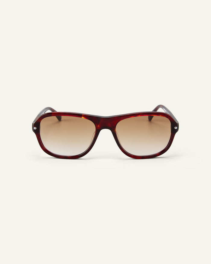 Face shot of Bonnie Clyde Boss Fight sunglasses in red tortoise with brown lenses.