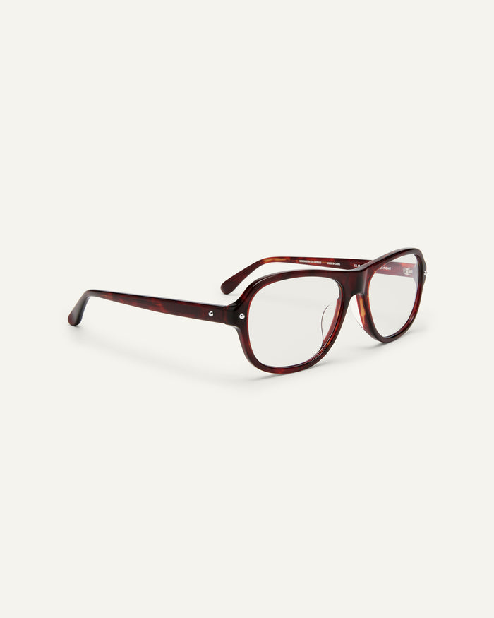 Side shot of Bonnie Clyde Boss Fight optical frames in red tortoise with clear lenses.