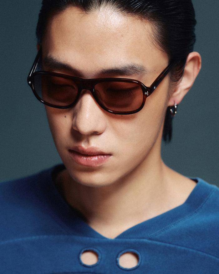 Side shot of Bonnie Clyde Boss Fight sunglasses in red tortoise with brown lenses.