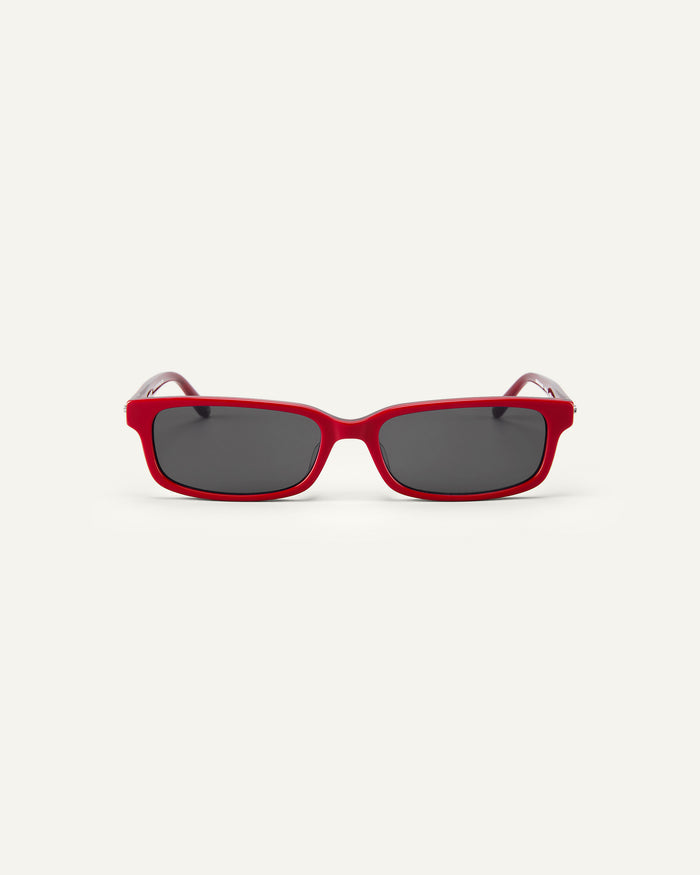 Face shot of Bonnie Clyde Boyfriend 2 sunglasses in layered red with black lenses.