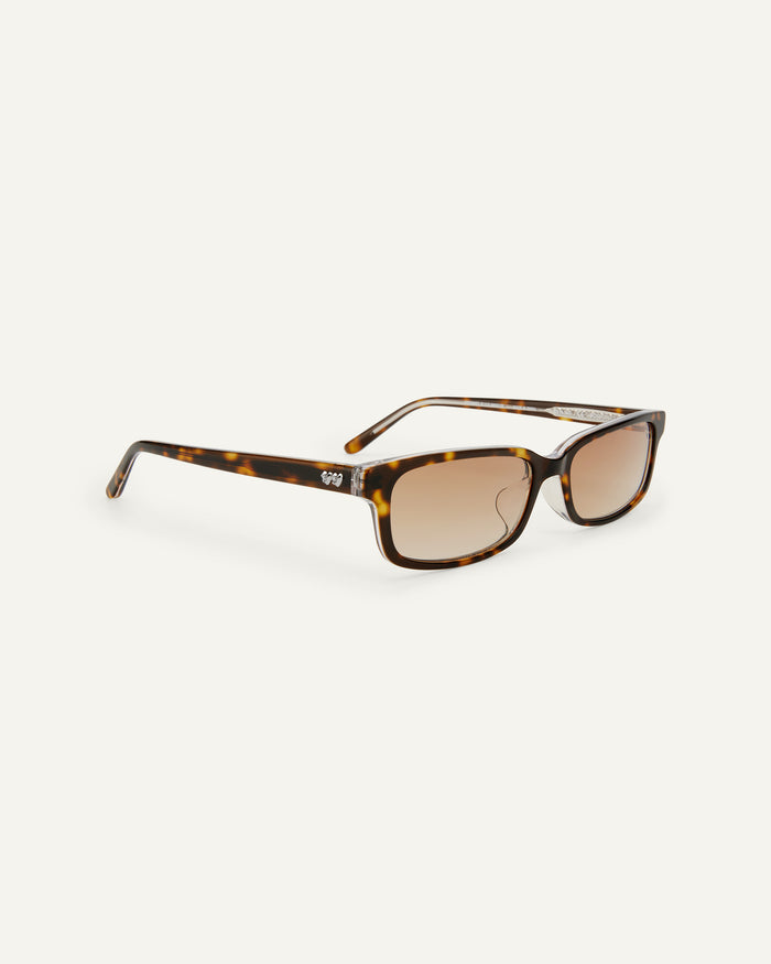 Side shot of Bonnie Clyde Boyfriend 2 sunglasses in layered tortoise with brown gradient lenses.