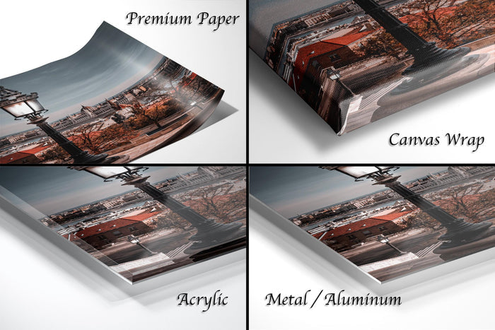 The image is a collage of four different photographs, each depicting a cityscape with a street lamp and buildings. The photographs are labeled as "Premium Paper", "Canvas Wrap", "Acrylic", and "Metal/Aluminum".