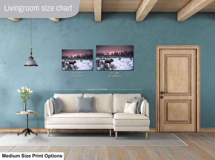 a living room with a white sofa, a wooden door, and a painting of a moose on the wall. The painting is of medium size, and the sofa is of standard size. The living room has a blue wall and a wooden floor.