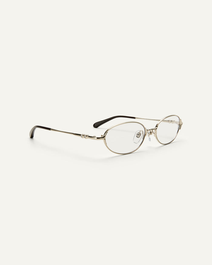 Quarter shot of Bonnie Clyde Bunny optical frames in stainless steel silver and clear lens.