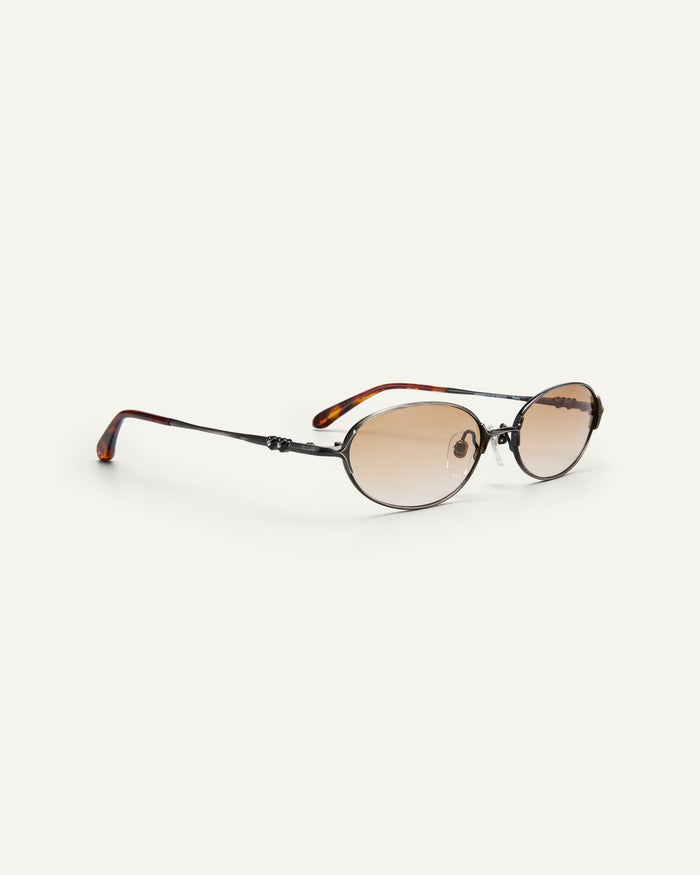 Quarter shot of Bonnie Clyde Bunny sunglasses in black titanium with brown gradient lenses.