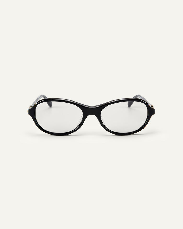 Face shot of Bonnie Clyde Butter Knife optical frames in black with clear lenses.
