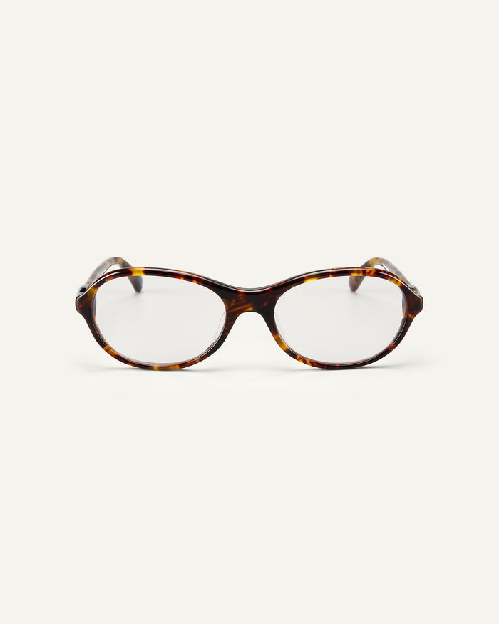 Face shot of Bonnie Clyde Butter Knife optical frames in tortoise with clear lenses.