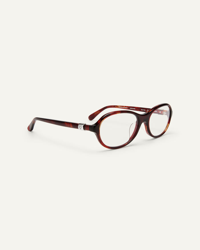 Side shot of Bonnie Clyde Butter Knife optical frames in red tortoise with clear lenses.