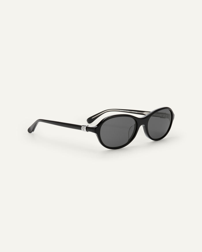 Side shot of Bonnie Clyde Butter Knife sunglasses in black with black lenses.