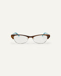 Face shot of Bonnie Clyde CC optical frames in layered demi teal with clear lenses.