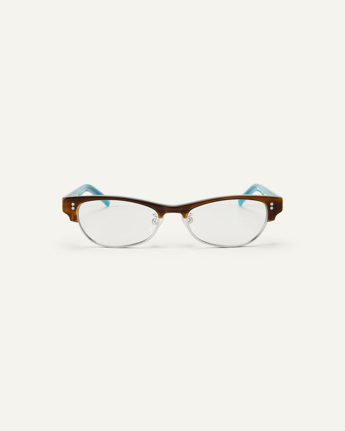 Face shot of Bonnie Clyde CC optical frames in layered demi teal with clear lenses.