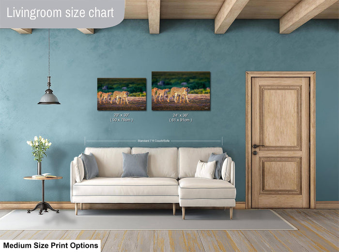 a living room with a white sofa, a wooden door, and a painting of a group of animals on the wall. The painting is of a size chart, indicating the dimensions of the artwork in both "Standard" and "Extra Large" sizes.
