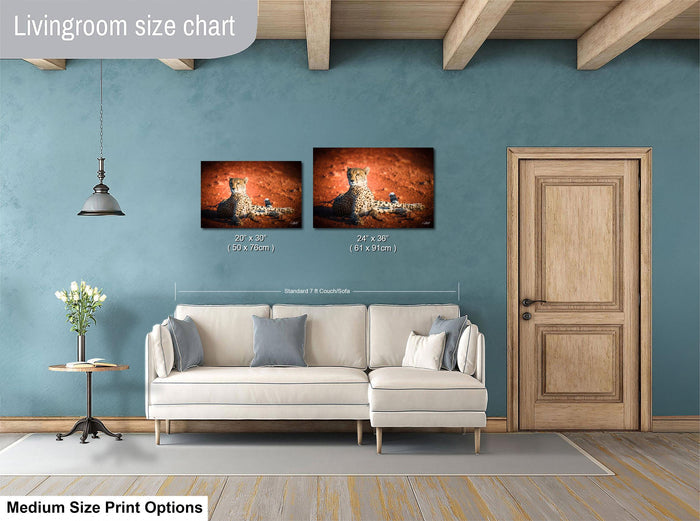 a living room with a white sofa, a wooden door, and a painting of a cheetah on the wall. The living room appears to be designed for relaxation and comfort, with a focus on the artwork and the overall aesthetic.