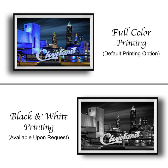 The image is a collage of two framed pictures. The top picture is a full-color print of a city skyline at night, while the bottom picture is a black and white print of the same city skyline. Both pictures feature the word "Cleveland" prominently displayed.
